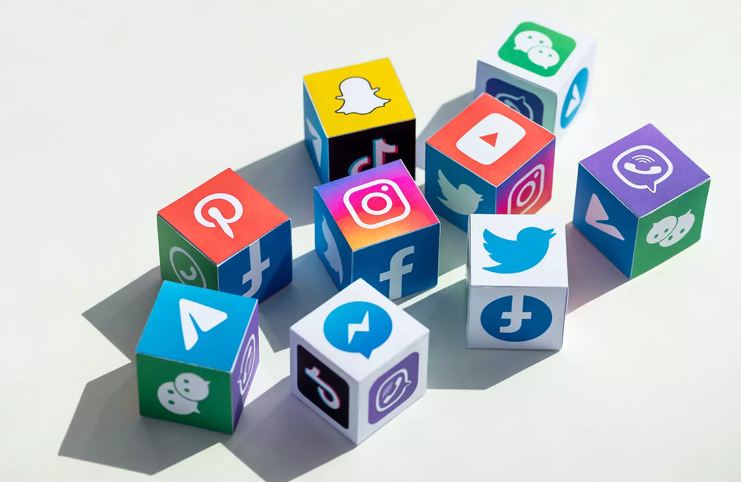 social media platforms logos on cubes